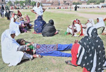 women fainted while waiting in queue to collect BISP cash